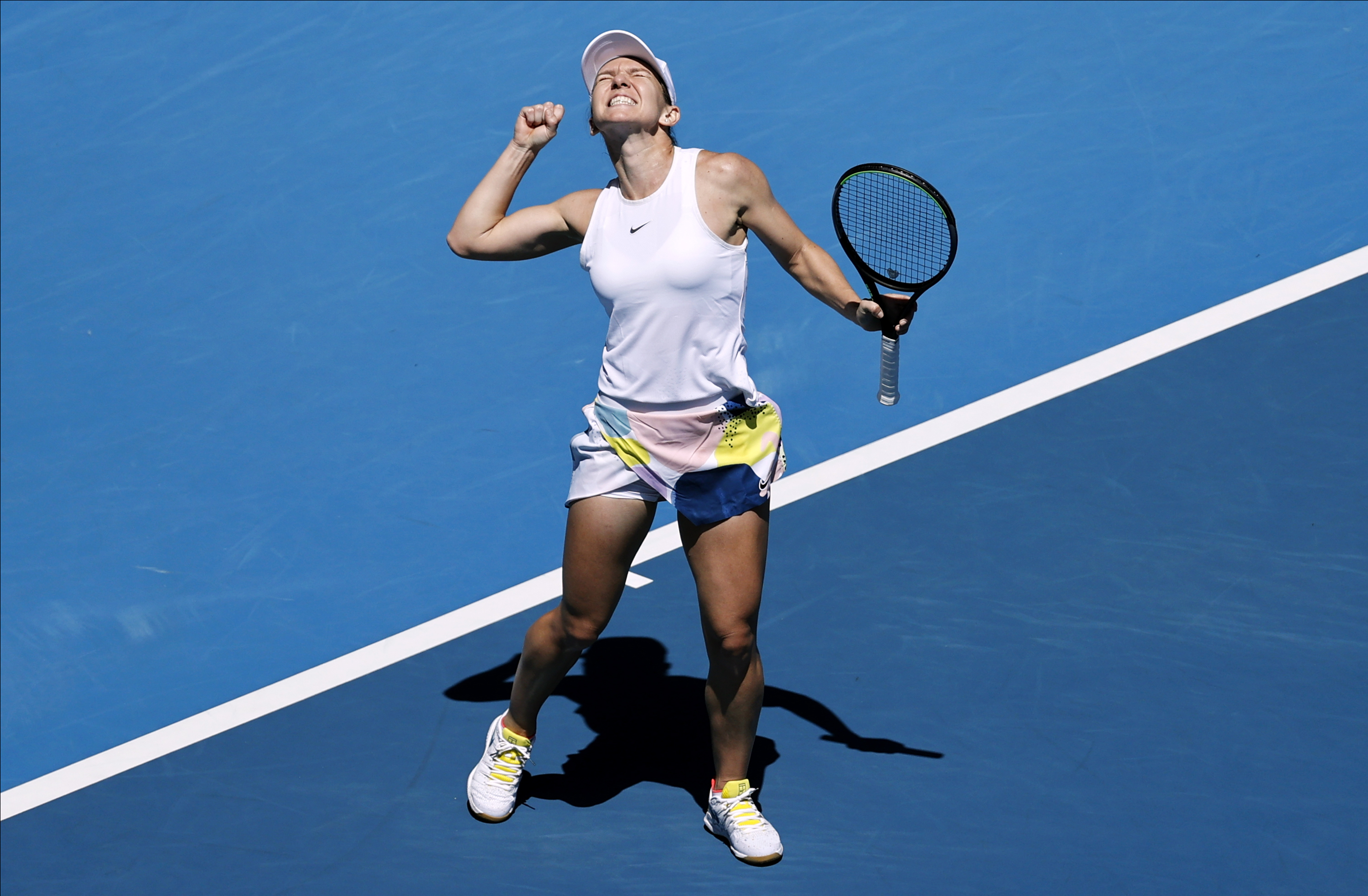 Halep, Muguruza take contrasting paths to semis in Australia