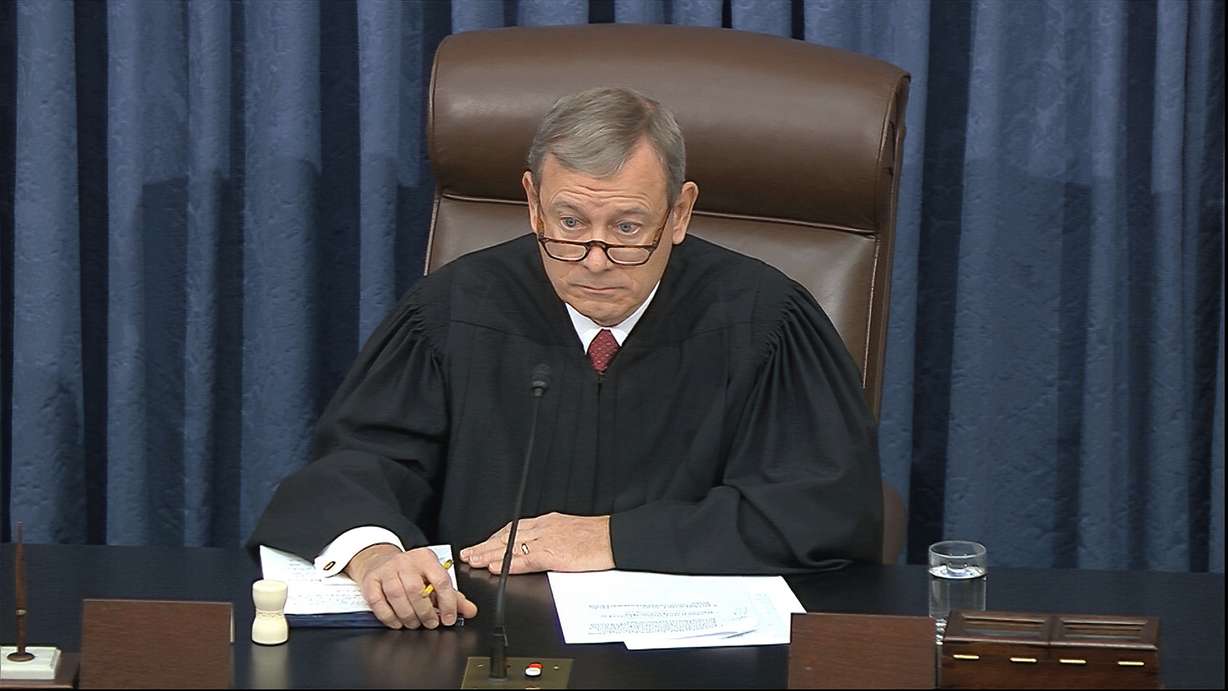 In this image from video, presiding officer Chief Justice of the United States John Roberts listens during the impeachment trial against President Donald Trump in the Senate at the U.S. Capitol in Washington, Wednesday, Jan. 29, 2020. (Senate Television via AP)