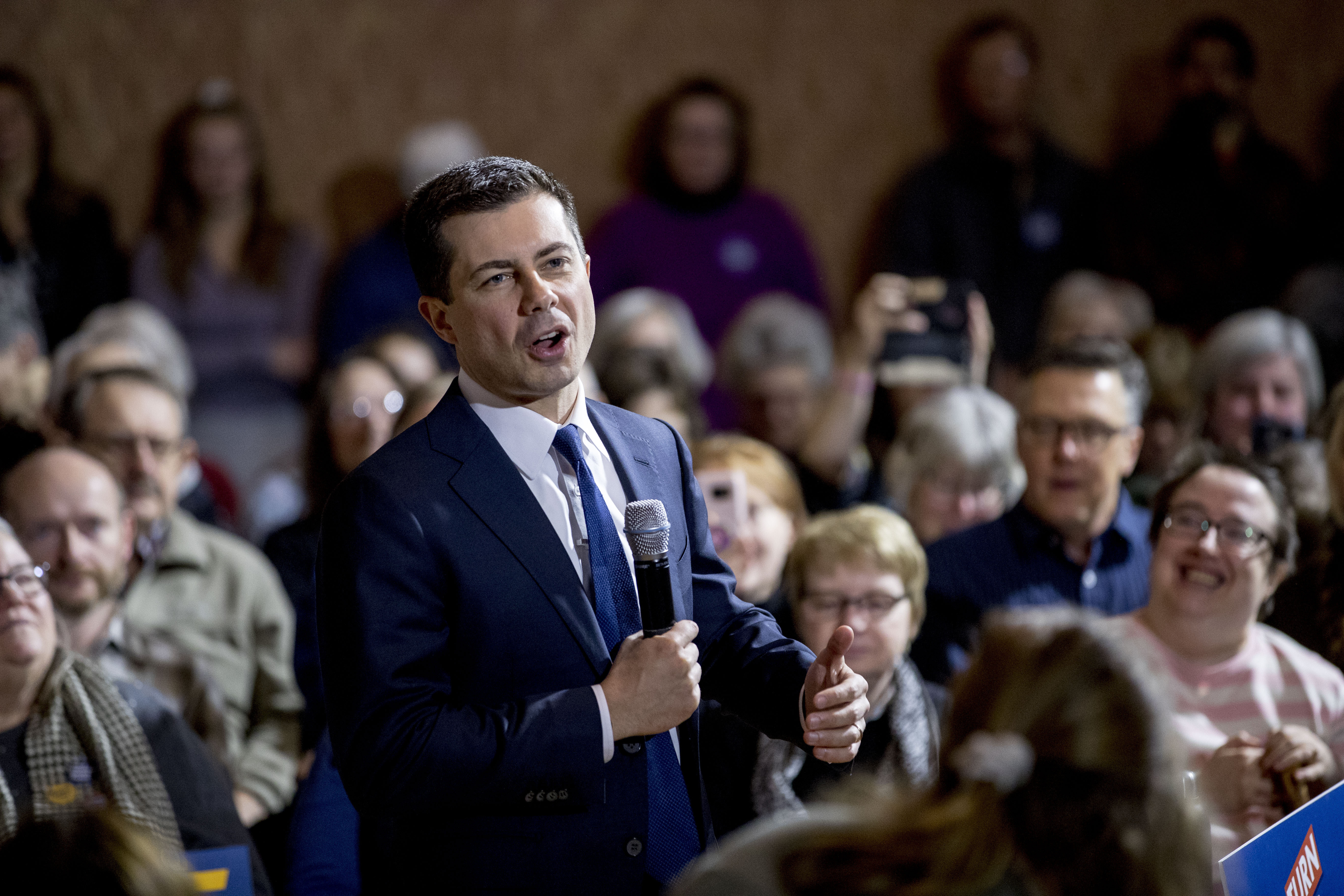 Buttigieg sharpens Biden, Sanders attacks as caucuses near