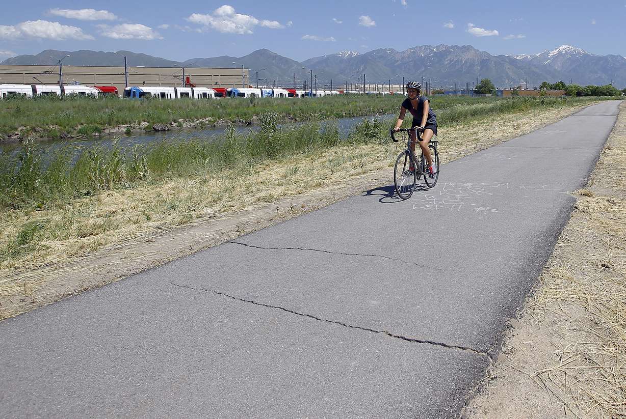 A cyclist rides along the Jordan River Parkway Trail at the Redwood Trailhead Park in West Valley City, Tuesday, June 2, 2015. (Photo: Chris Samuels, KSL, File)