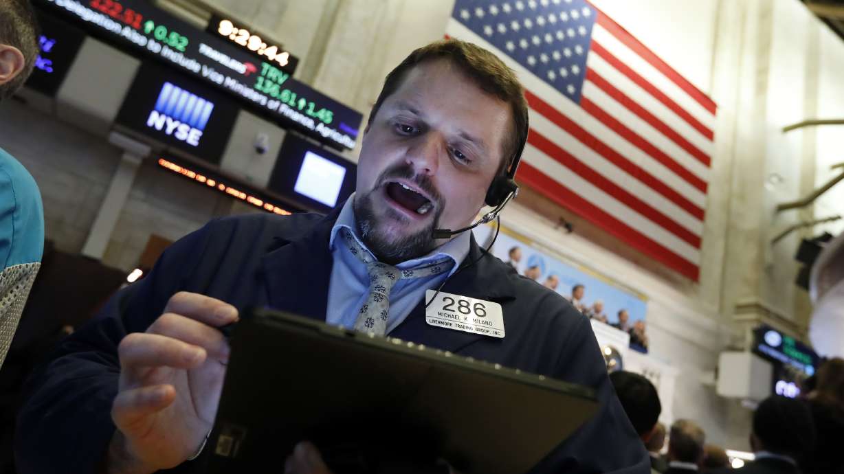 Stocks drop amid uncertainty over virus impact; Amazon soars