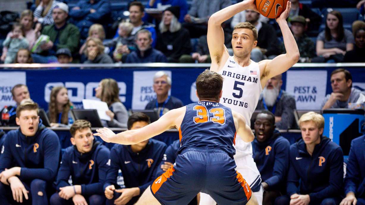 Brigham Young Cougars guard Jake Toolson (5) plays offense against the Pepperdine Waves in Provo on Thursday, Jan. 30, 2020. BYU won 107-80.
