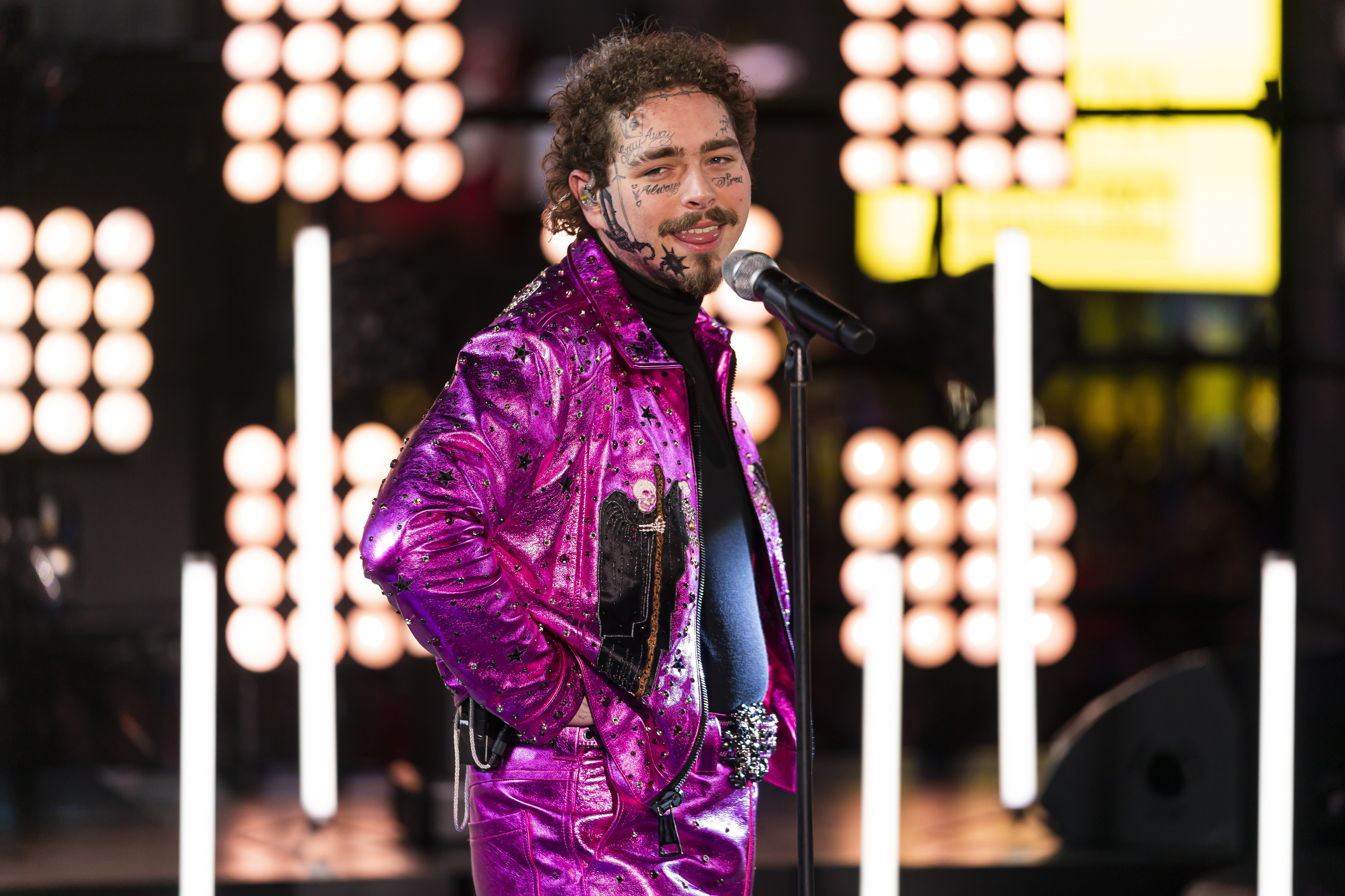 Torrential rains overshadow Post Malone pre-Super Bowl show