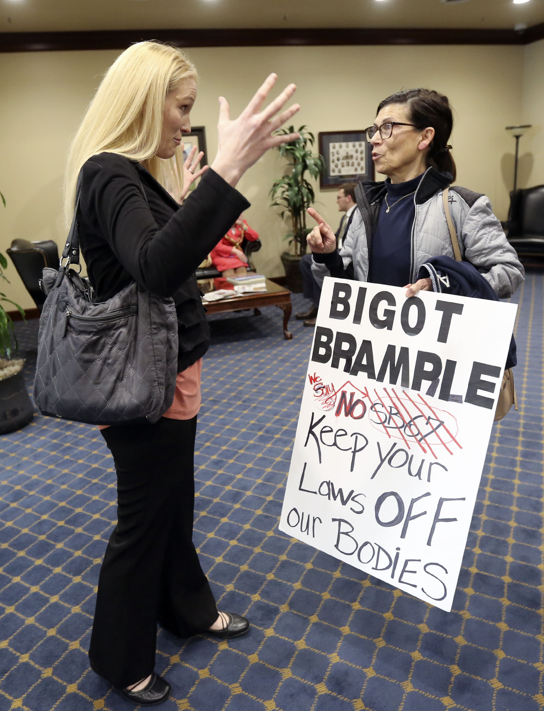 Kristy Nielsen and Kathy Adams argue over requirements for disposing of fetal remains from miscarriages and abortions after the Senate Health and Human Services Committee debated SB67 in the Senate Building at the Capitol complex in Salt Lake City on Friday, Jan. 31, 2020. (Photo: Kristin Murphy, KSL)