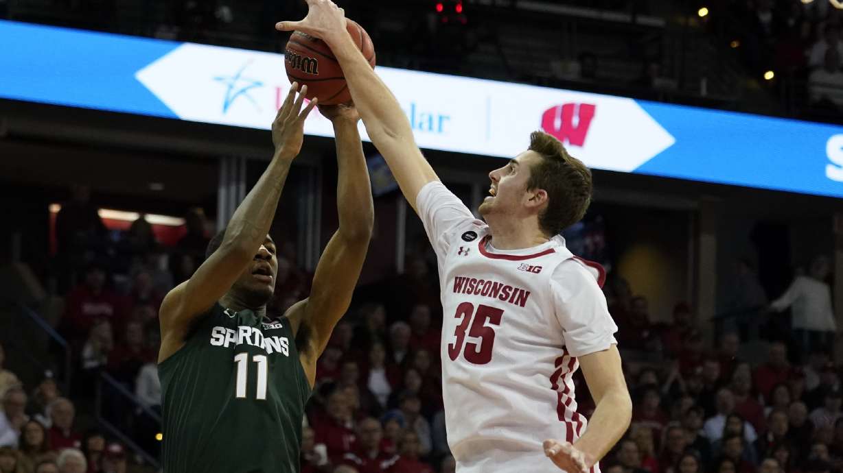 Wisconsin edges No. 14 Michigan State 64-63