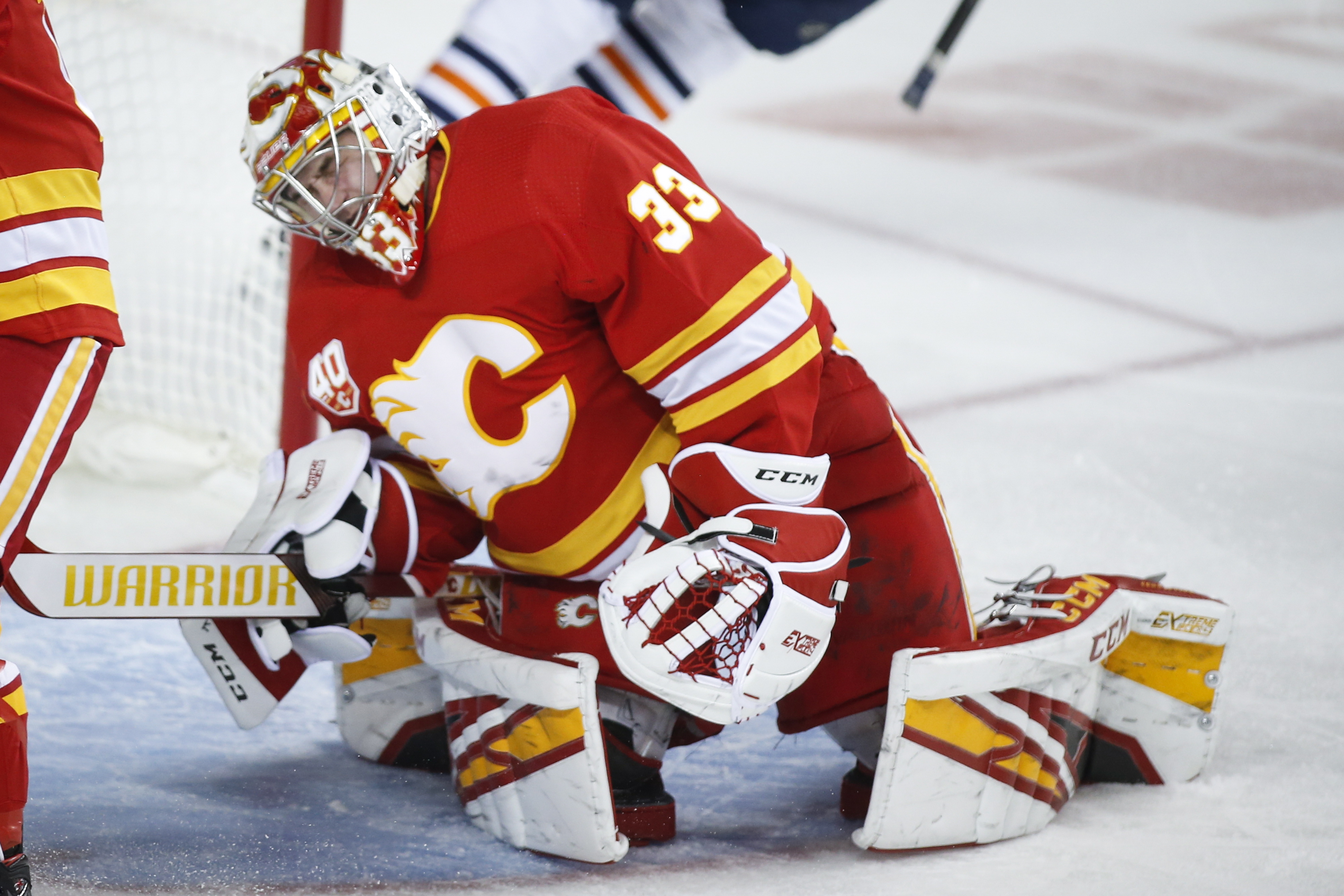 Oilers top Flames 8-3; goalies Mike Smith, Cam Talbot fight
