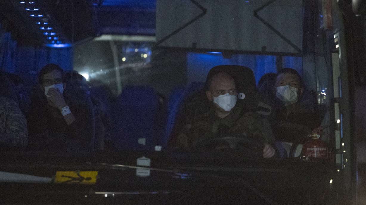 Europeans flee China, France urges help for poor nations