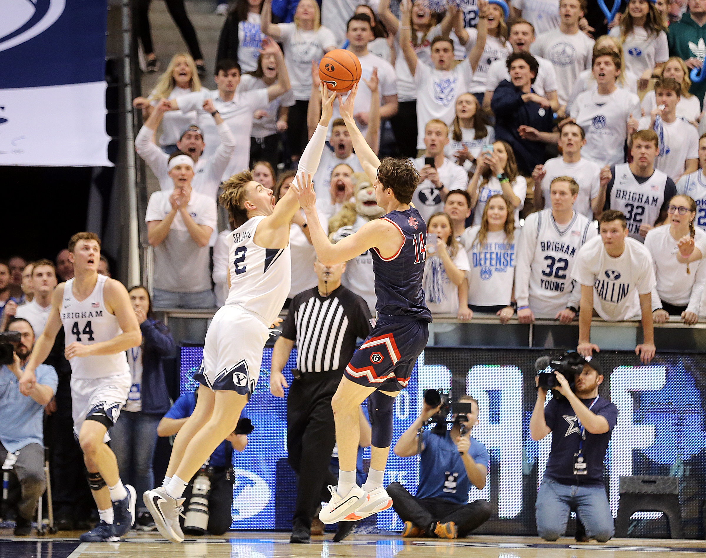 Brigham Young Cougars guard Zac Seljaas (2) blocks a last ditch effort by St. Mary's Gaels forward Kyle Bowen (14) as BYU goes on to defeat Saint Mary’s in an NCAA basketball game in Provo at the Marriott Center on Saturday, Feb. 1, 2020. BYU won 81-79. (Photo: Scott G Winterton, KSL)