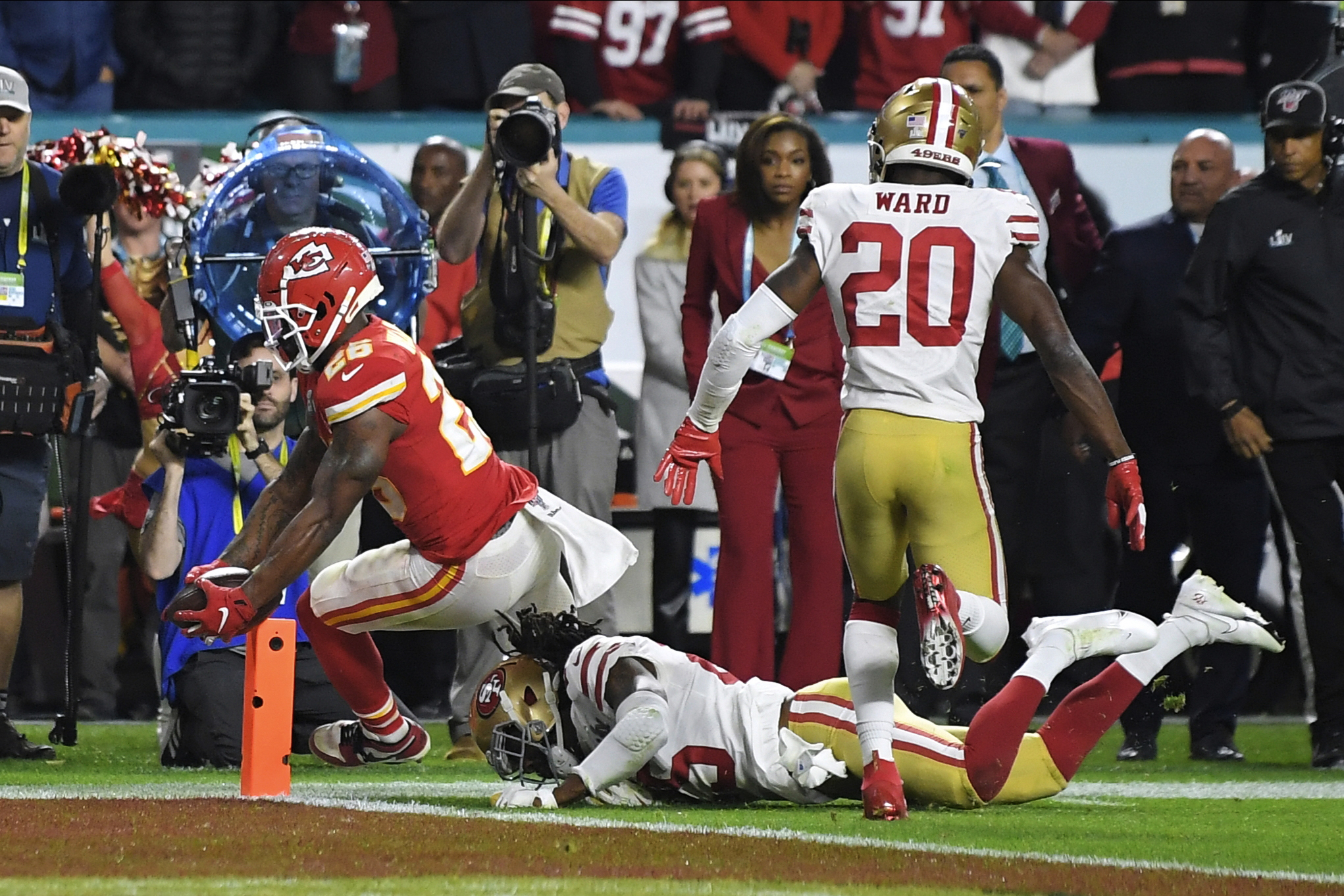 Kansas City Chiefs' Damien Williams, left, crosses the goal line for a touchdown against the San Francisco 49ers during the second half of the NFL Super Bowl 54 football game Sunday, Feb. 2, 2020, in Miami Gardens, Fla. (Photo: Mark J. Terrill, AP)