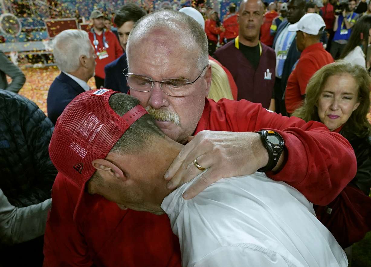 Kansas City Chiefs head coach Andy Reid, rear, puts his arm around San Francisco 49ers head coach Kyle Shanahan after the Chiefs defeated the 49ers in the NFL Super Bowl 54 football game Sunday, Feb. 2, 2020, in Miami Gardens, Fla. (Photo: David J. Phillip, AP)