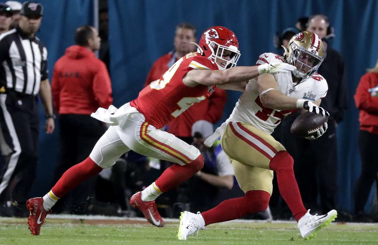 San Francisco 49ers' Kyle Juszczyk (44) catches a pass in front of Kansas City Chiefs' Daniel Sorensen before scoring during the first half of the NFL Super Bowl 54 football game Sunday, Feb. 2, 2020, in Miami Gardens, Fla. (Photo: Wilfredo Lee, AP)