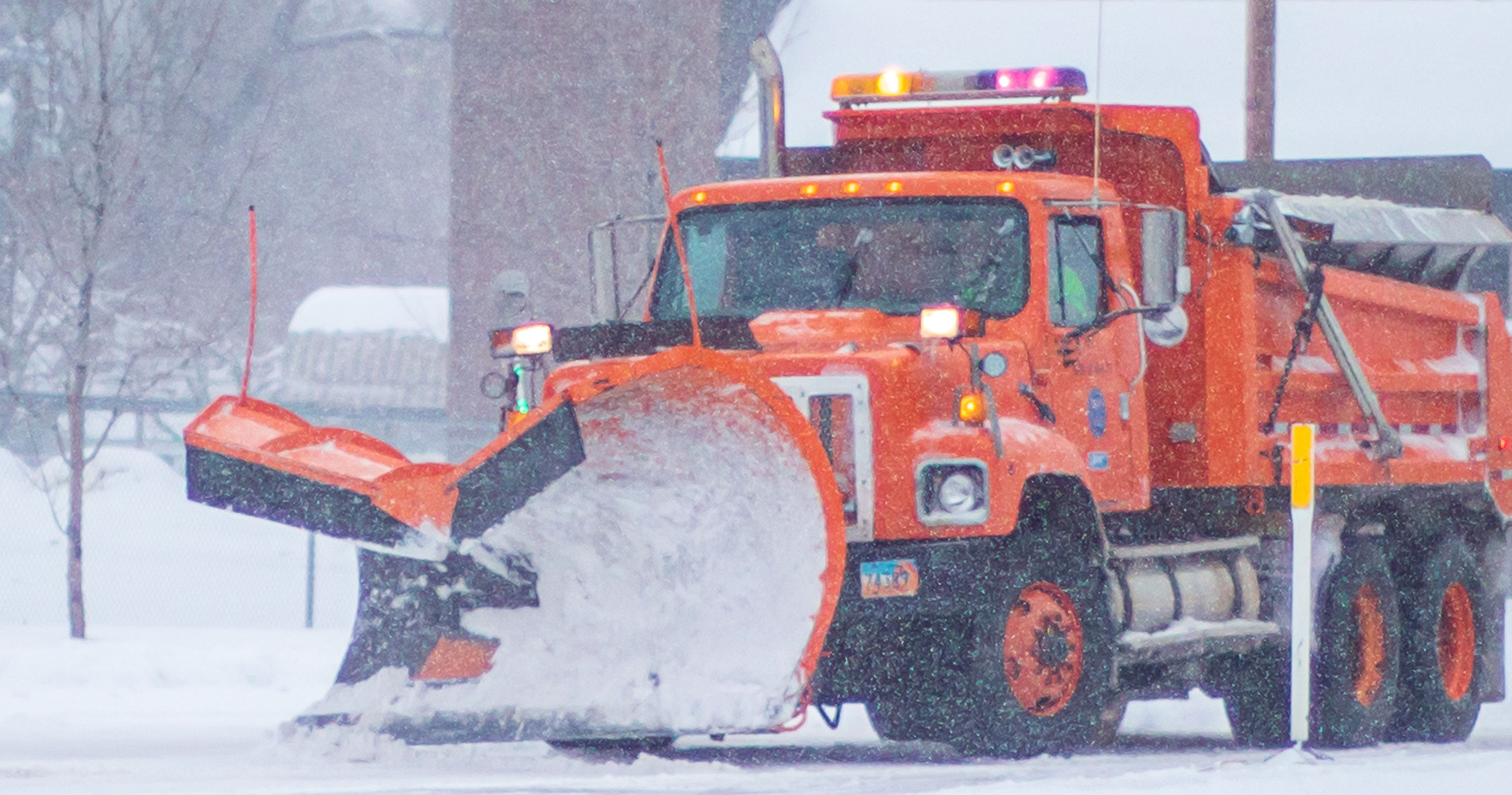 A snow plow pushes snow off of 300 West in Salt Lake City on Monday, Feb. 3, 2020. (Photo: Carter Williams, KSL.com)