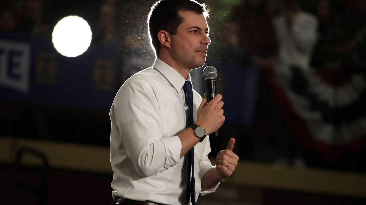 The Latest: Dems say delay due to coding error, results soon