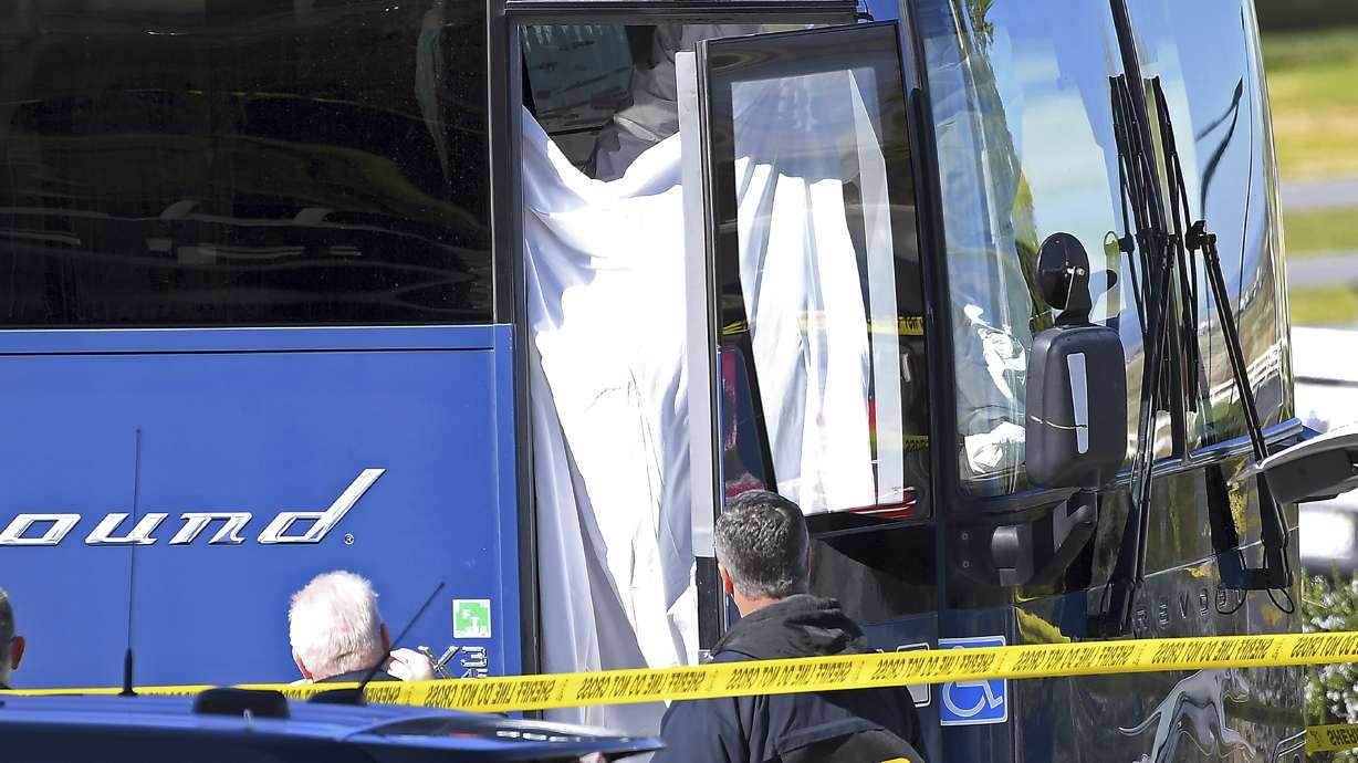 Maryland man held in bus shooting that killed 1, wounded 5