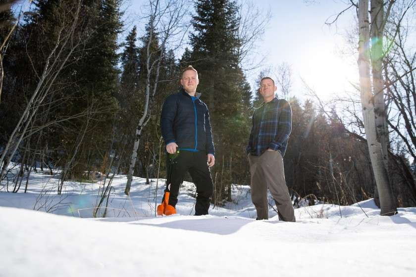 Jordan Maxwell, left, and Sam St. Clair pose for a photo in this undated photo. Maxwell and St. Clair led the study showing the relationship between wildfires and snowpack. (Photo courtesy Jaren Wilkey, BYU)