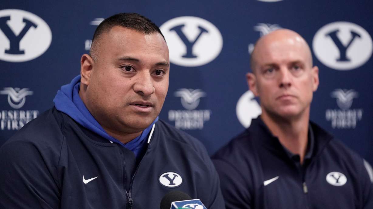 BYU football coach Kalani Sitake, with linebackers coach Ed Lamb, addressing the media on national signing day, Wednesday, Feb. 5, 2020 in Provo. (Courtesy: BYU Photo)