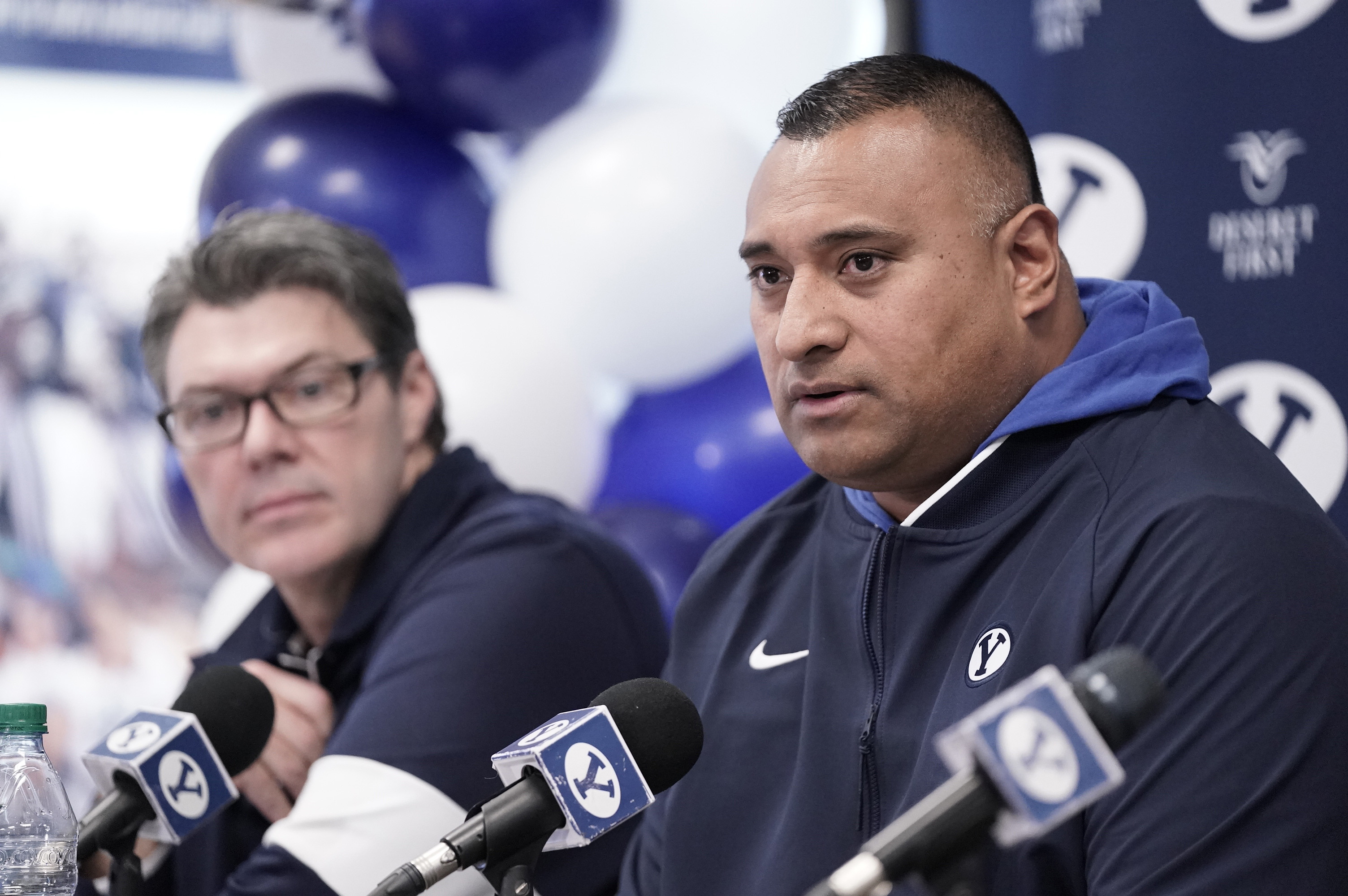 BYU football coach Kalani Sitake, with offensive coordinator Jeff Grimes, addressing the media on national signing day, Wednesday, Feb. 5, 2020 in Provo.