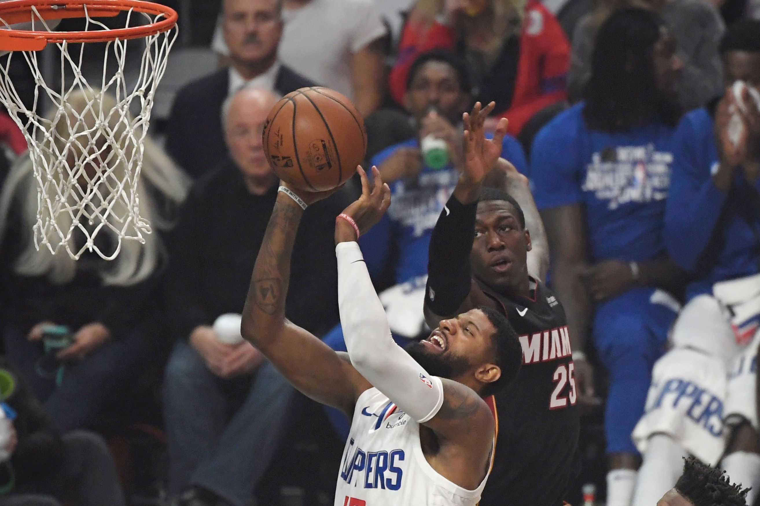 Clippers ride big 4th quarter to beat Heat 128-111 