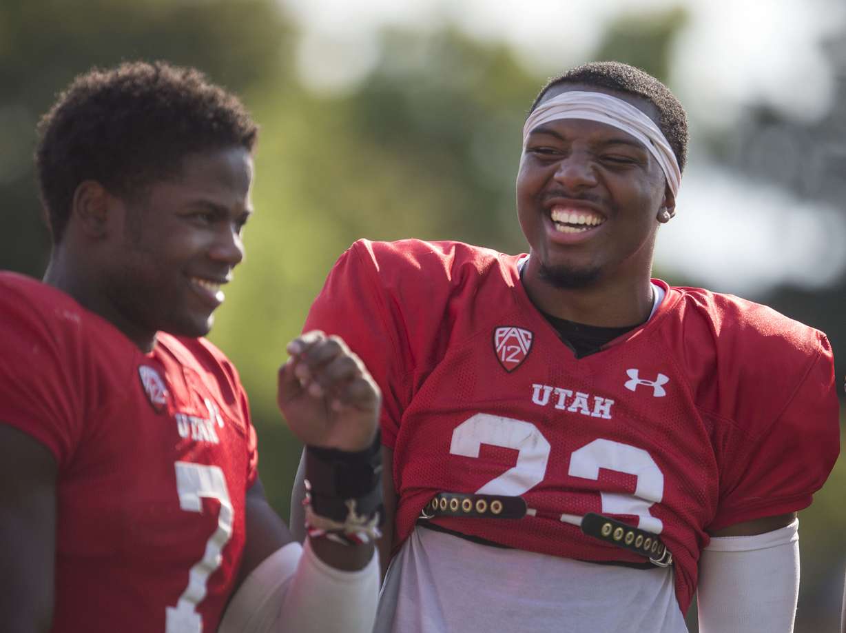 Running backs Devonta'e Henry-Cole, left, and Armand Shyne talk after a University of Utah football practice in Salt Lake City on Thursday, Aug. 3, 2017. (Photo: Kelsey Brunner, KSL)