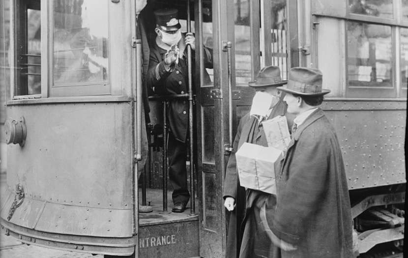 This photo taken in 1918 or 1919, shows precautions taken in Seattle, Washington during the influenza pandemic. The city would not permit anyone to ride on its streetcars without wearing a mask. 260,000 of these were made by the Seattle Chapter of the Red Cross, which consisted of 120 workers. Reports from the time indicate Utah had similar public precaution measures once the flu reached the state in October 1918. (Photo: U.S. Library of Congress)