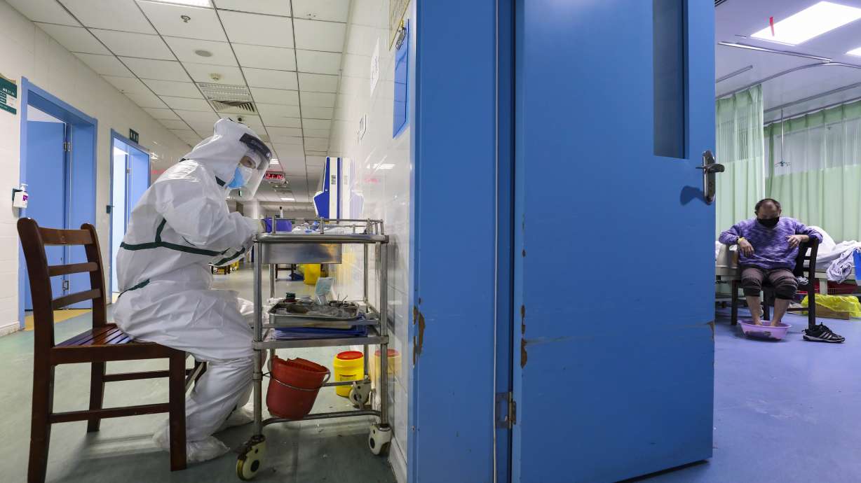 The Latest: WHO to send mission to virus-hit China