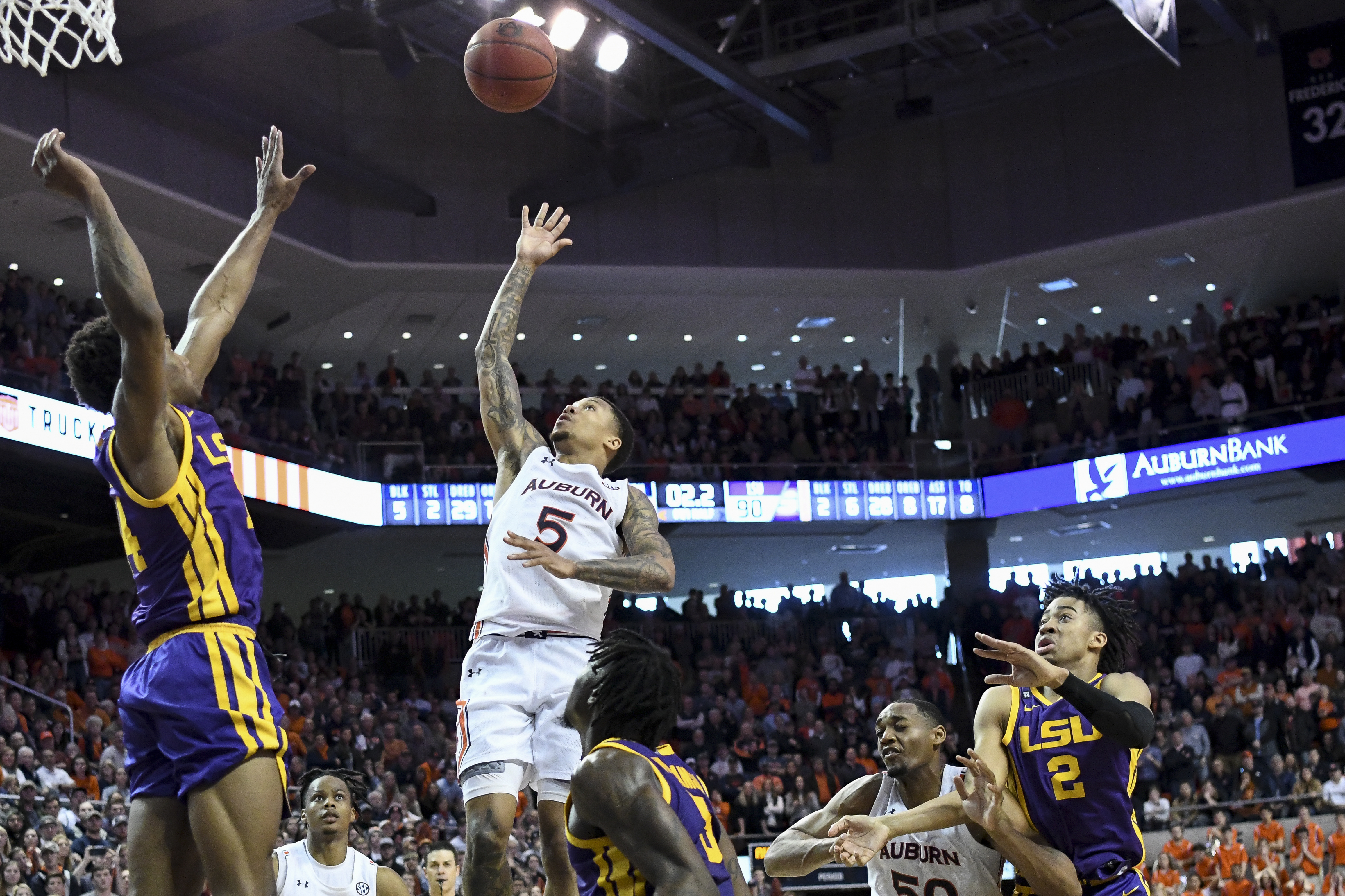 McCormick's OT basket lifts No. 11 Auburn past No. 18 LSU