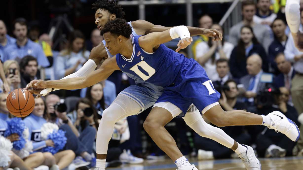 Jones, Moore help No. 7 Duke top rival UNC 98-96 in OT