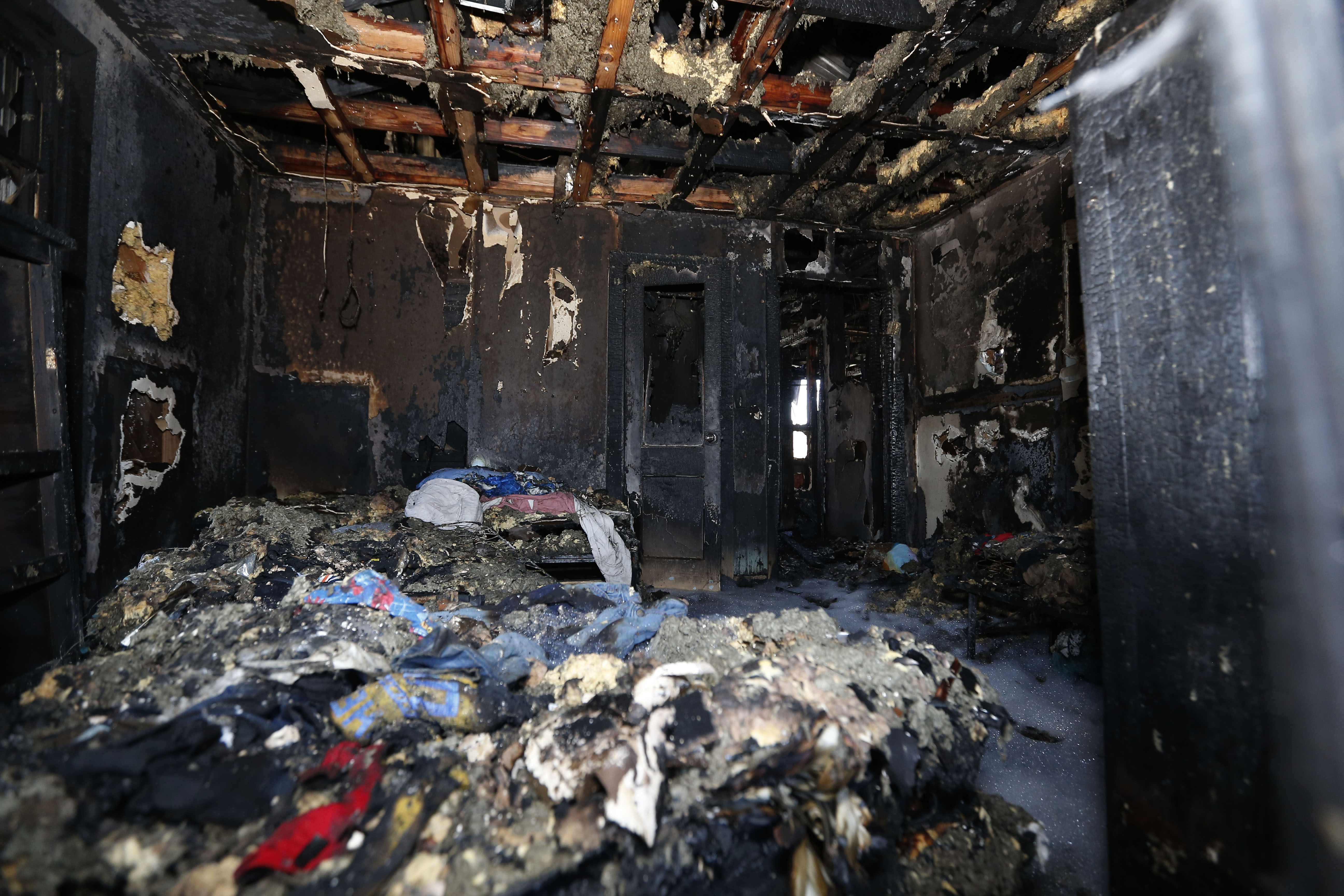 Investigators will look at window bars in Mississippi fire