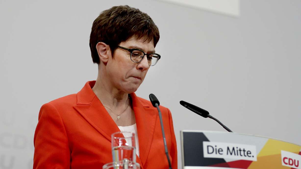 German politics upended as Merkel's heir apparent quits