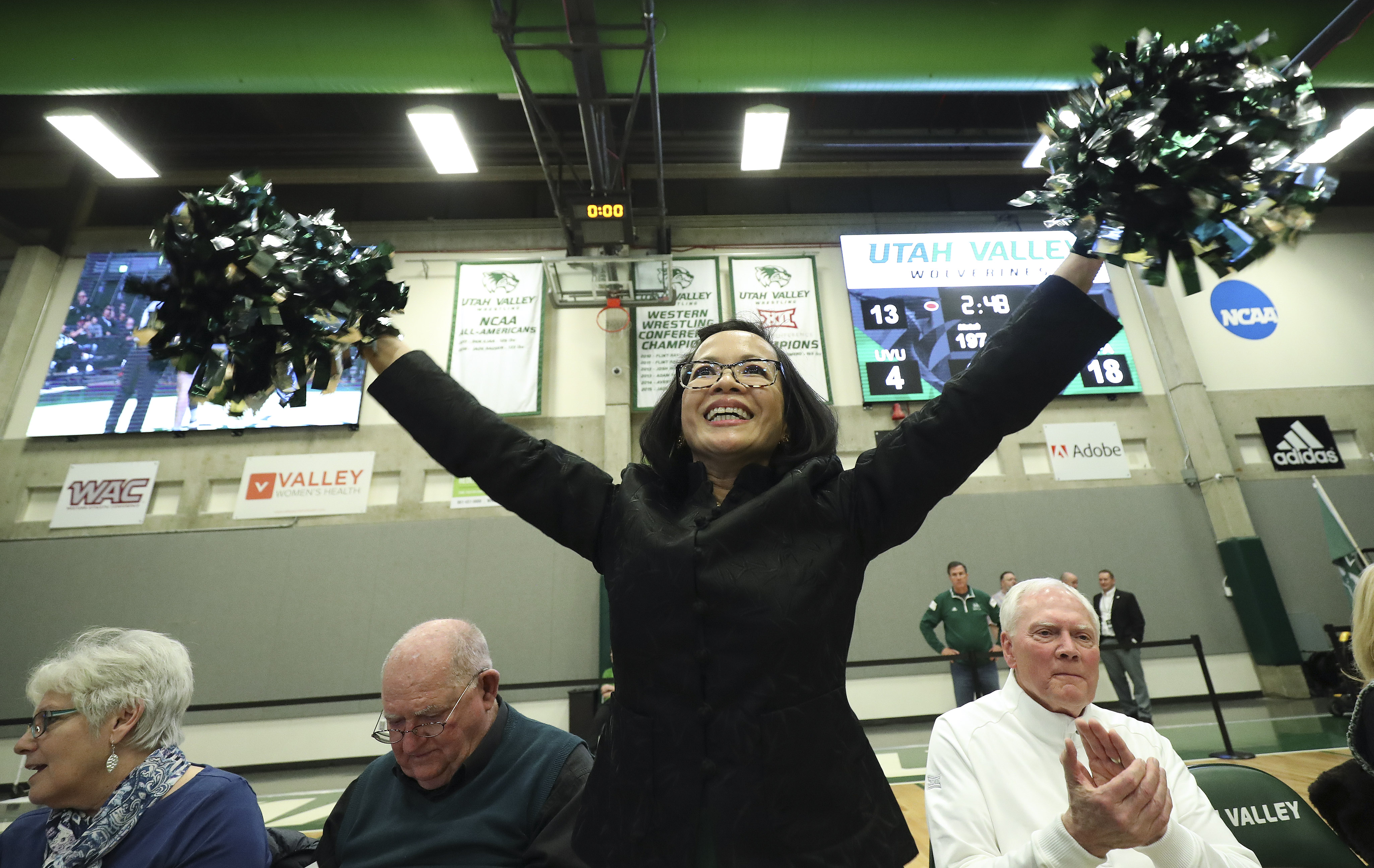 UVU wrestlers find their biggest fan in university president Astrid Tuminez