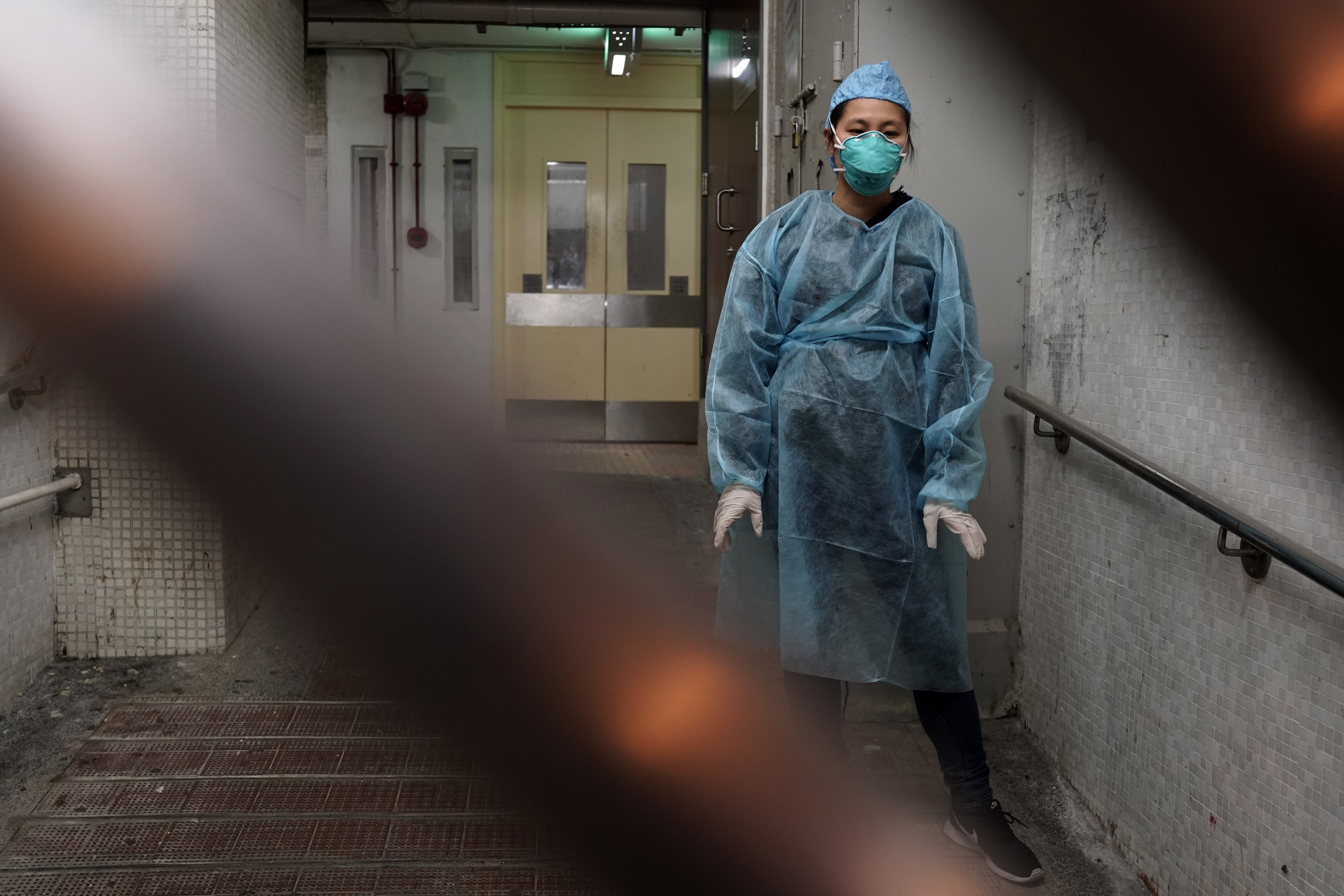 China still mostly closed down as virus deaths pass 1,000