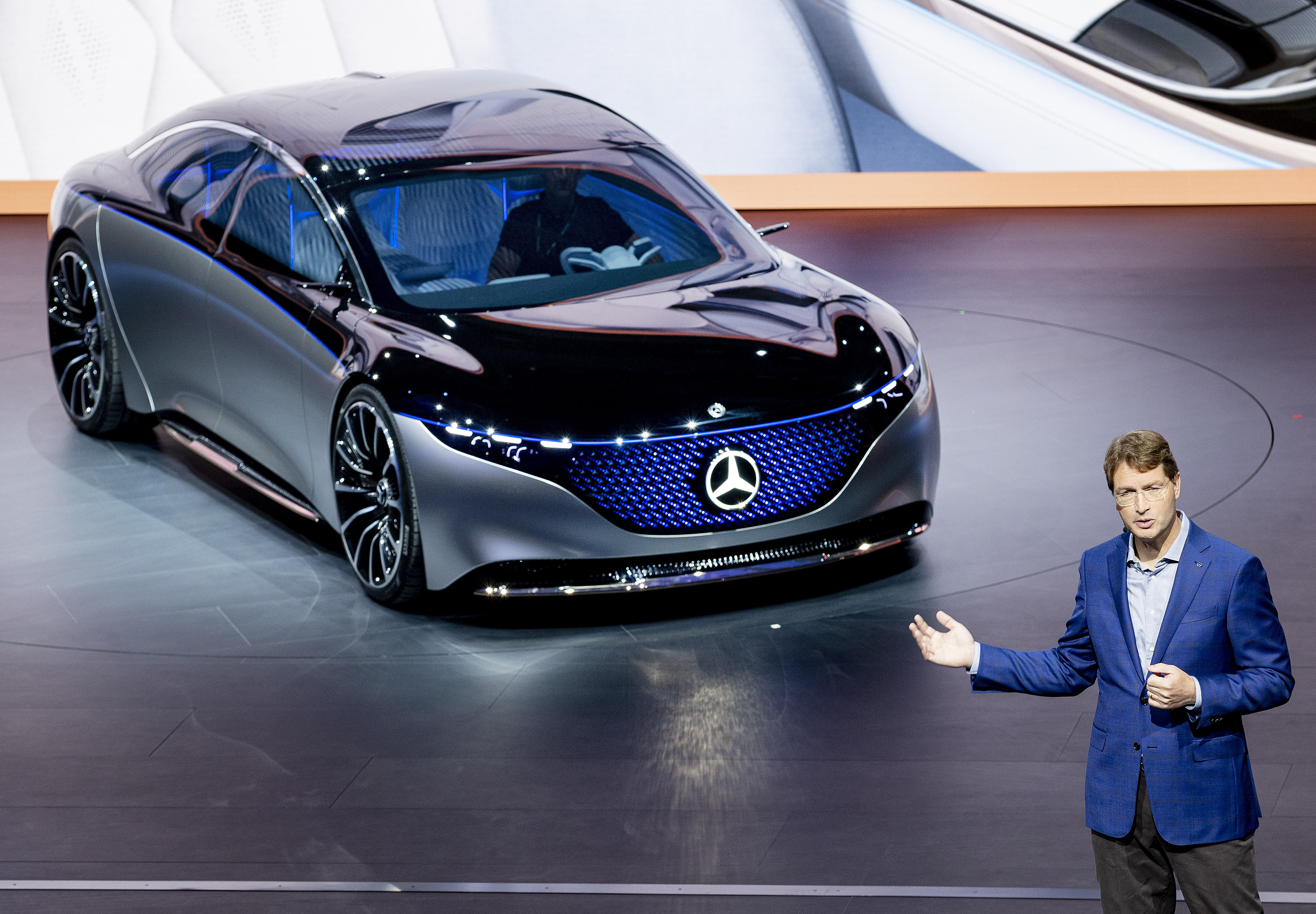 Daimler profits slump as auto industry comes under pressure