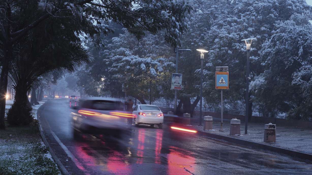 Iraqis wake up to snow for first time in over a decade