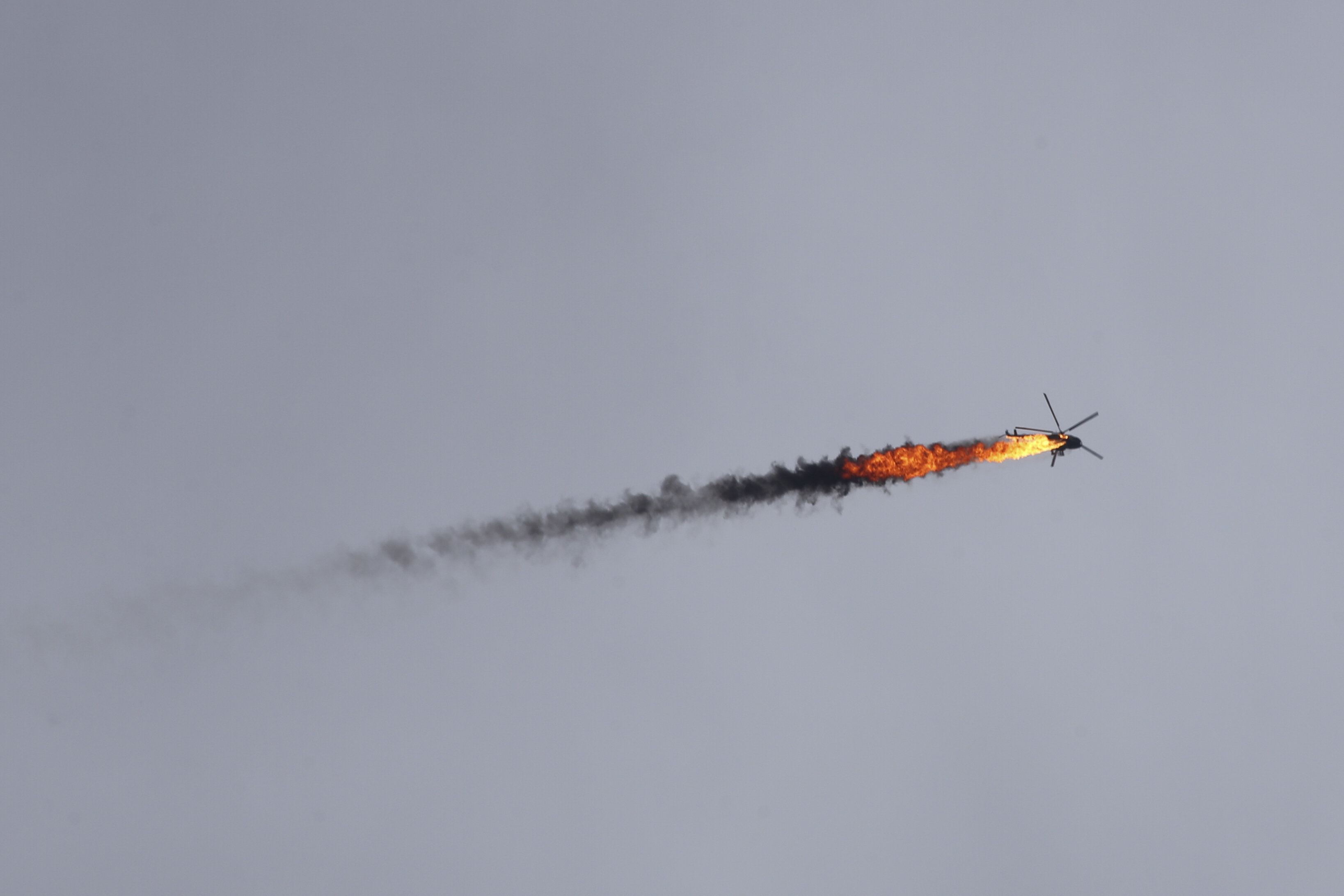 Rebels shoot down Syrian helicopter as fighting intensifies