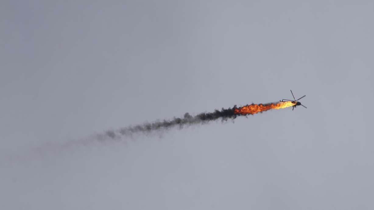 Rebels shoot down Syrian helicopter as fighting intensifies
