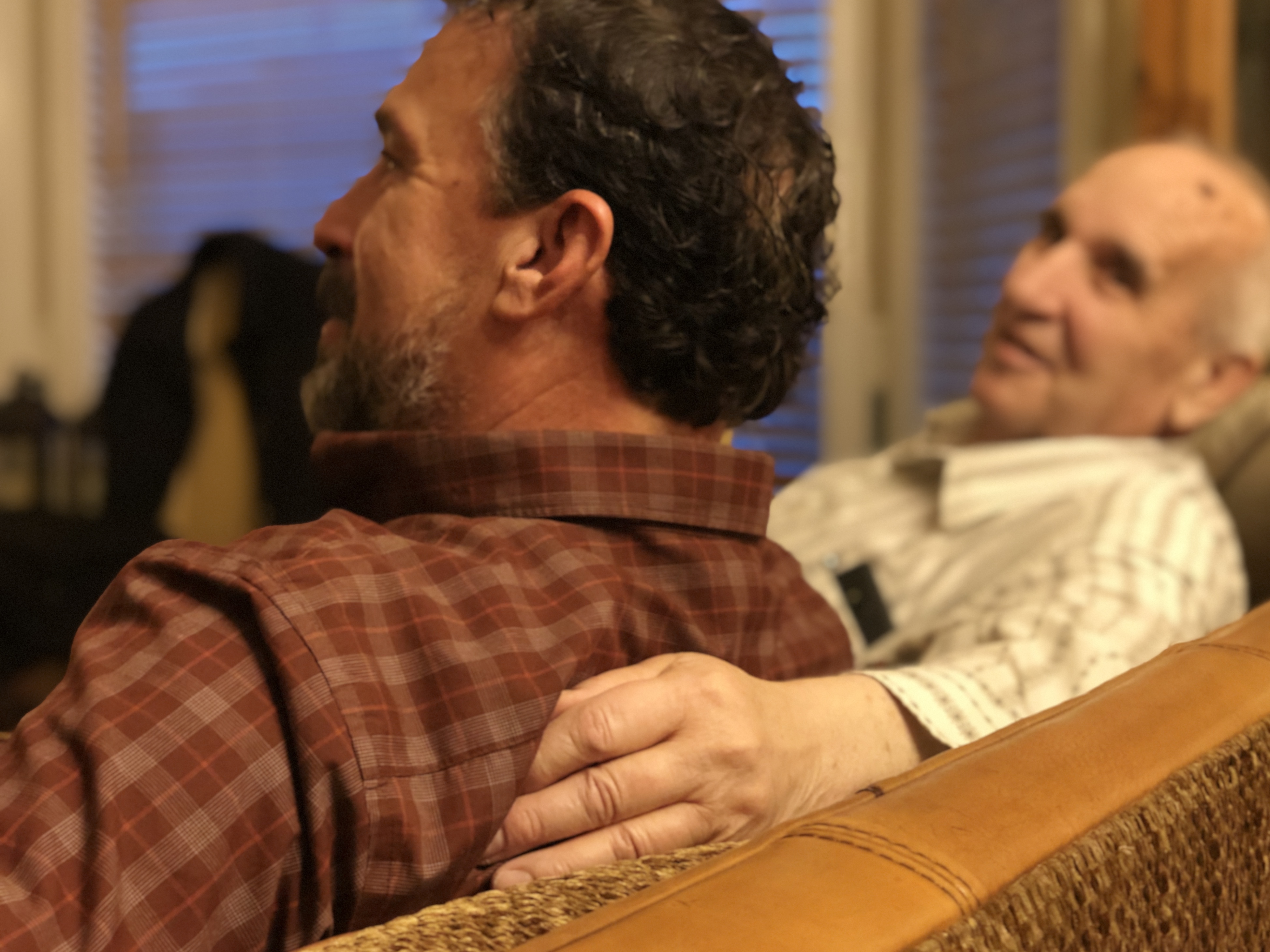 Stephen Bobowski puts his arm around Juan Vasquez's shoulders. (Photo: Liesl Nielsen, KSL.com)