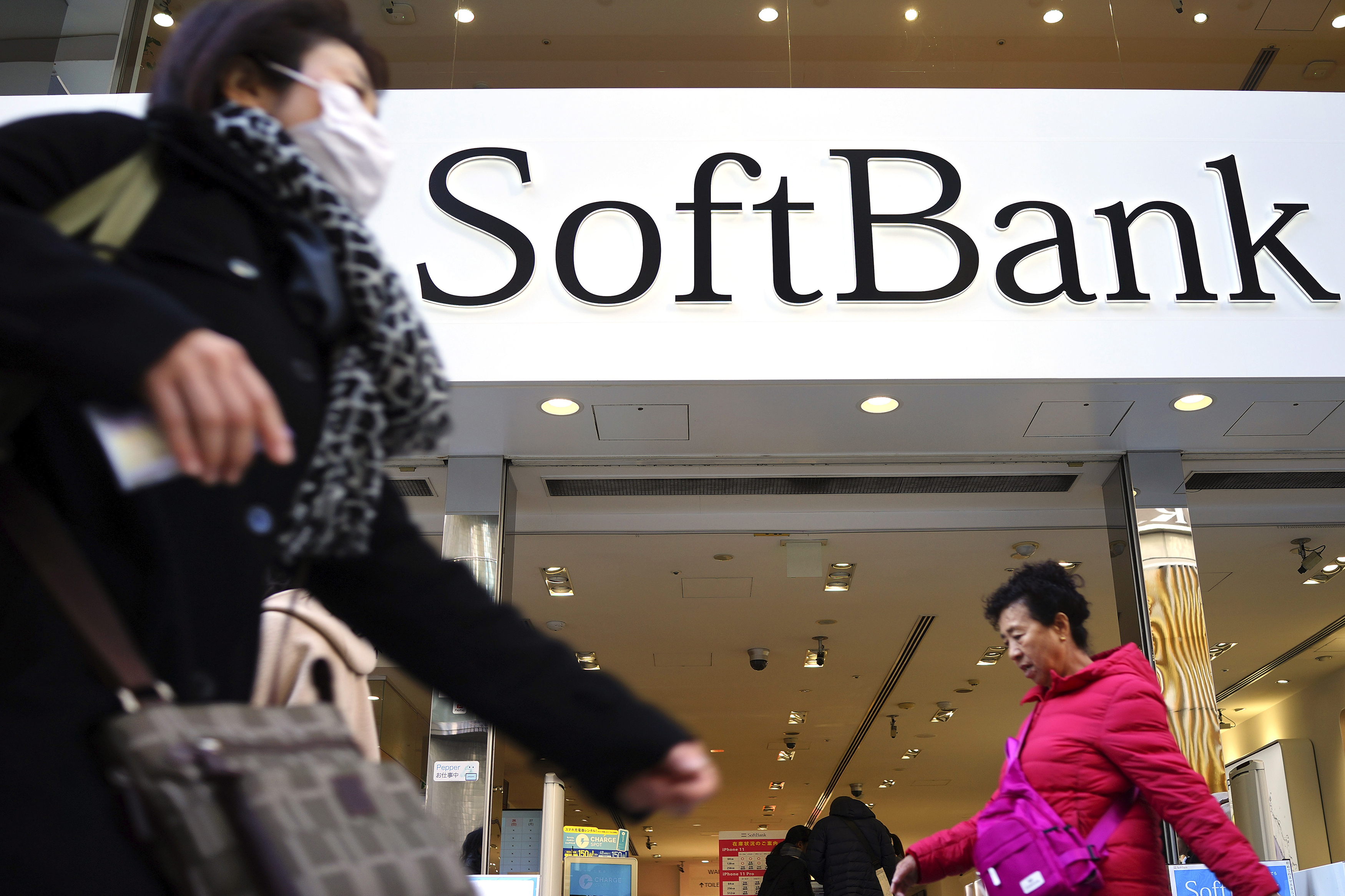 SoftBank's profit drop amid WeWork worries, Sprint approval