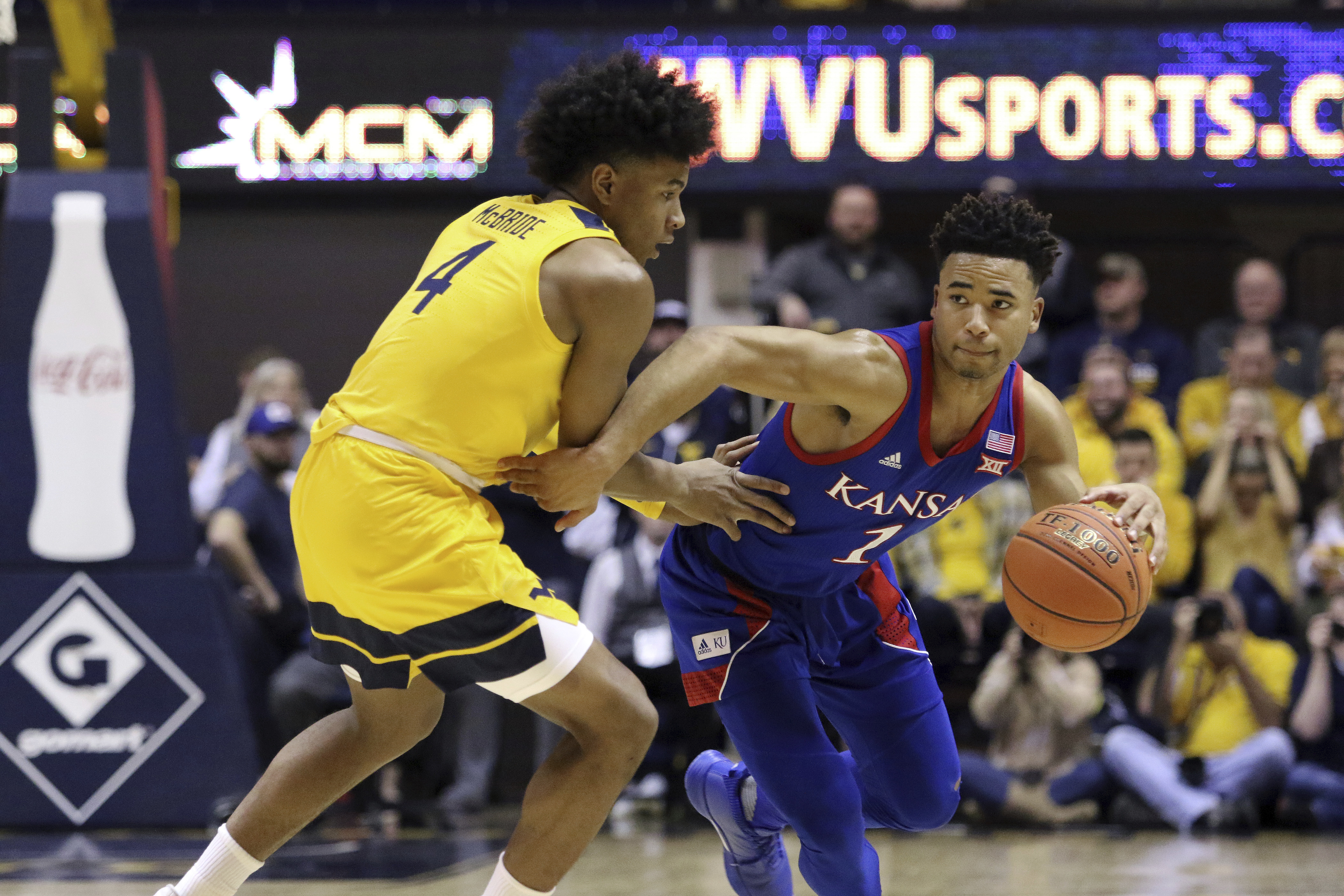 No. 3 Kansas scores final 9 points, beats No. 14 WVU 58-49