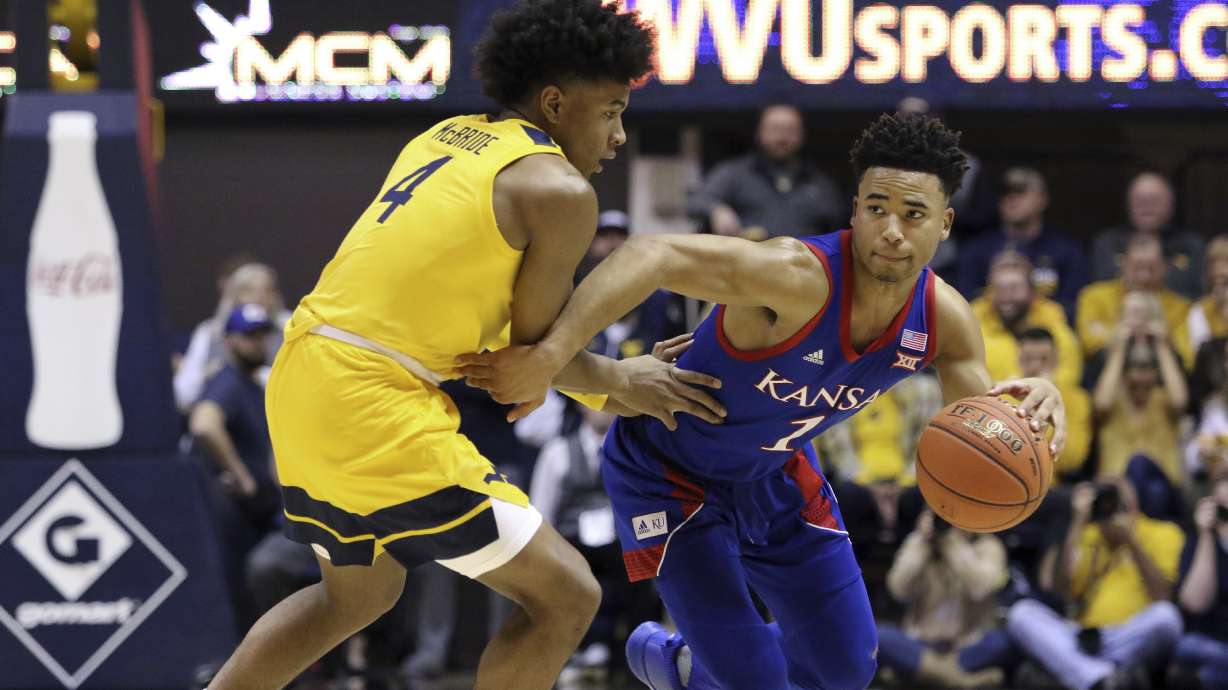 No. 3 Kansas scores final 9 points, beats No. 14 WVU 58-49