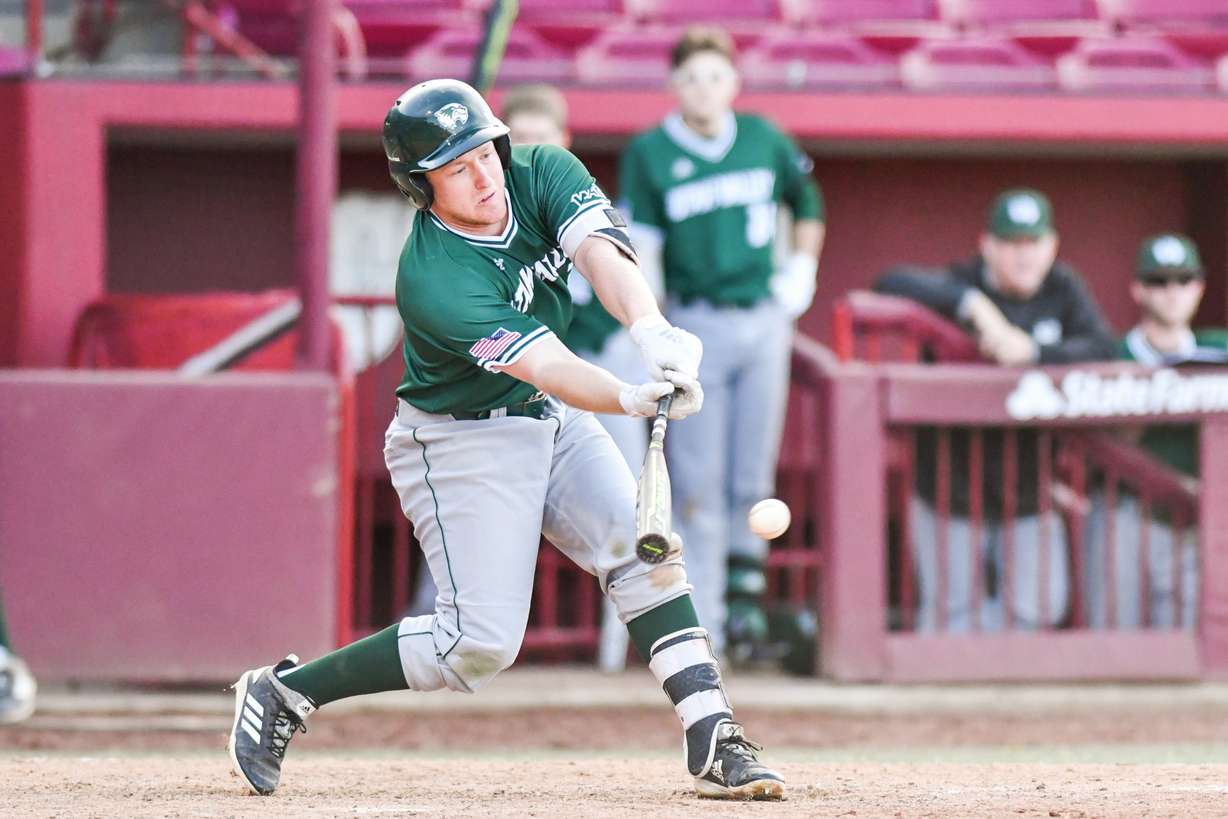Utah Valley junior right fielder Alexander Marco reaches out to try to drive a ball during Sunday's game at Founders Park in Columbia, S.C., against the South Carolina Gamecocks. Marco led UVU in the game by going 2-for-4 with a double and a run scored. (Photo: Wes Wilson, File)