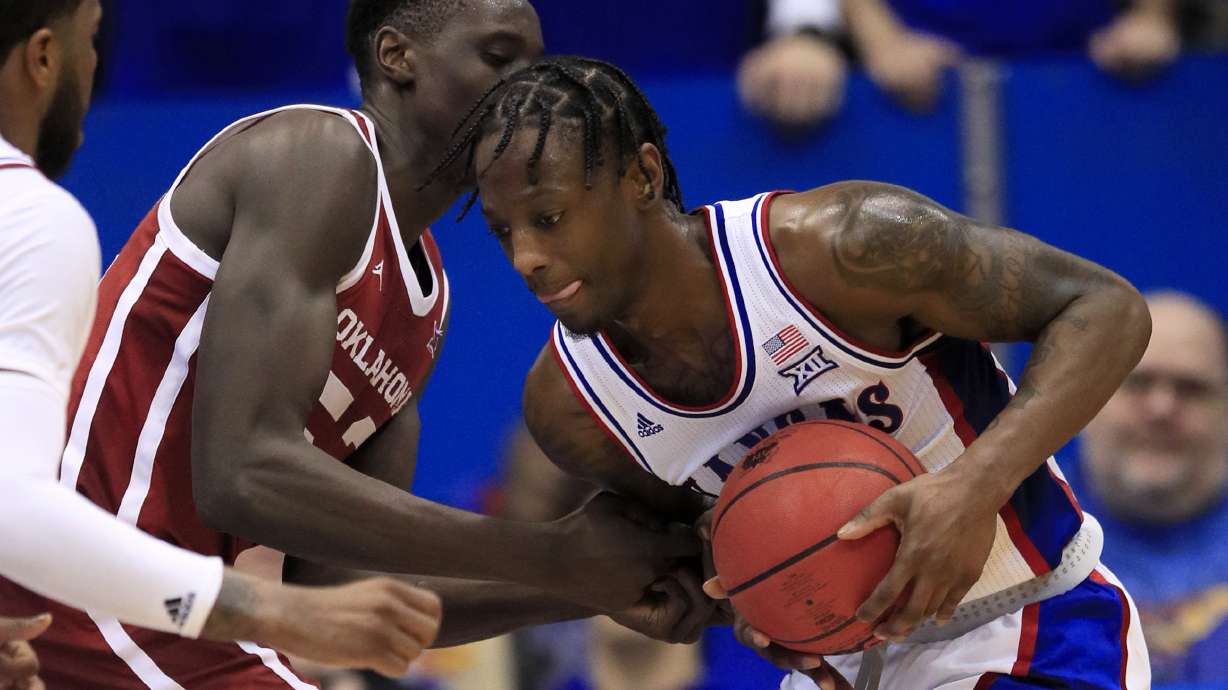 Garrett's career-high 24 points lead No. 3 KU past Oklahoma