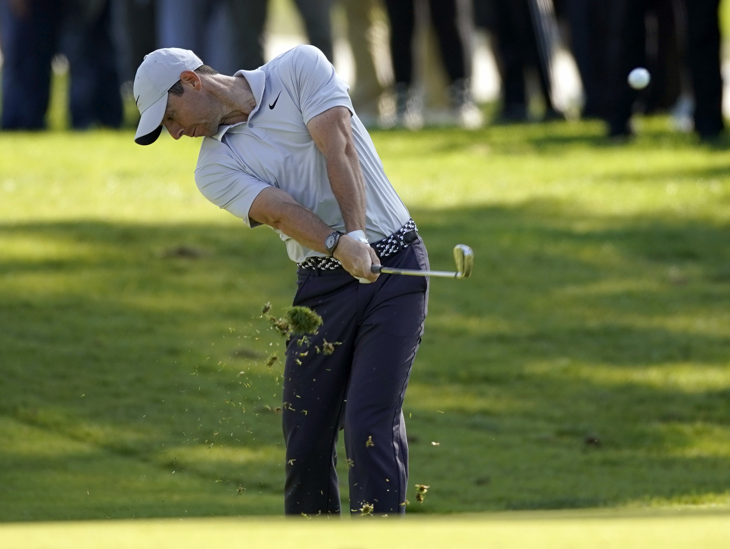 McIlroy, Scott, Kuchar share lead at Riviera; Woods falters