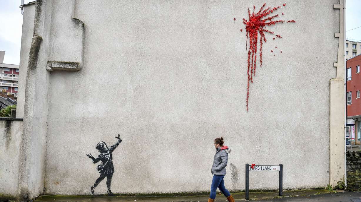 Banksy's Valentine's Day mural covered after it was defaced
