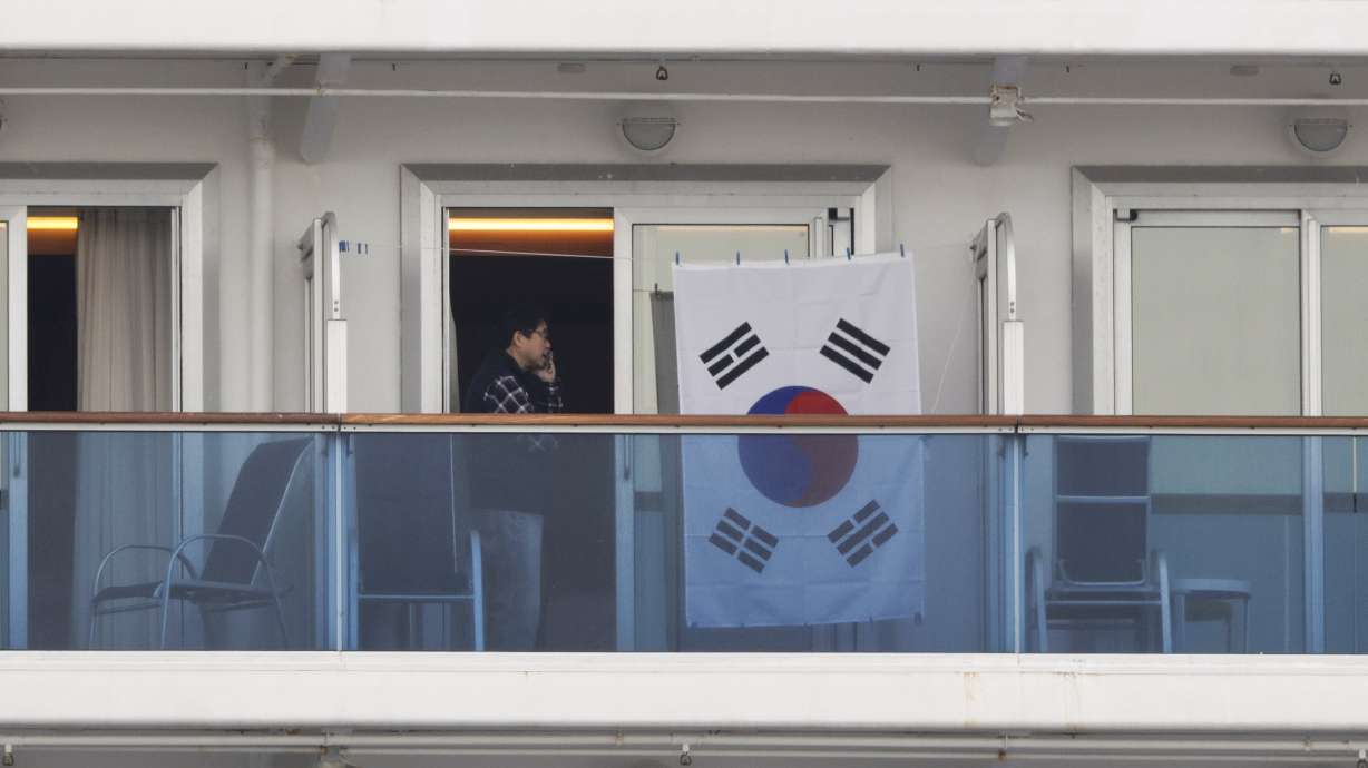 Japan says 88 more virus cases confirmed on quarantined ship