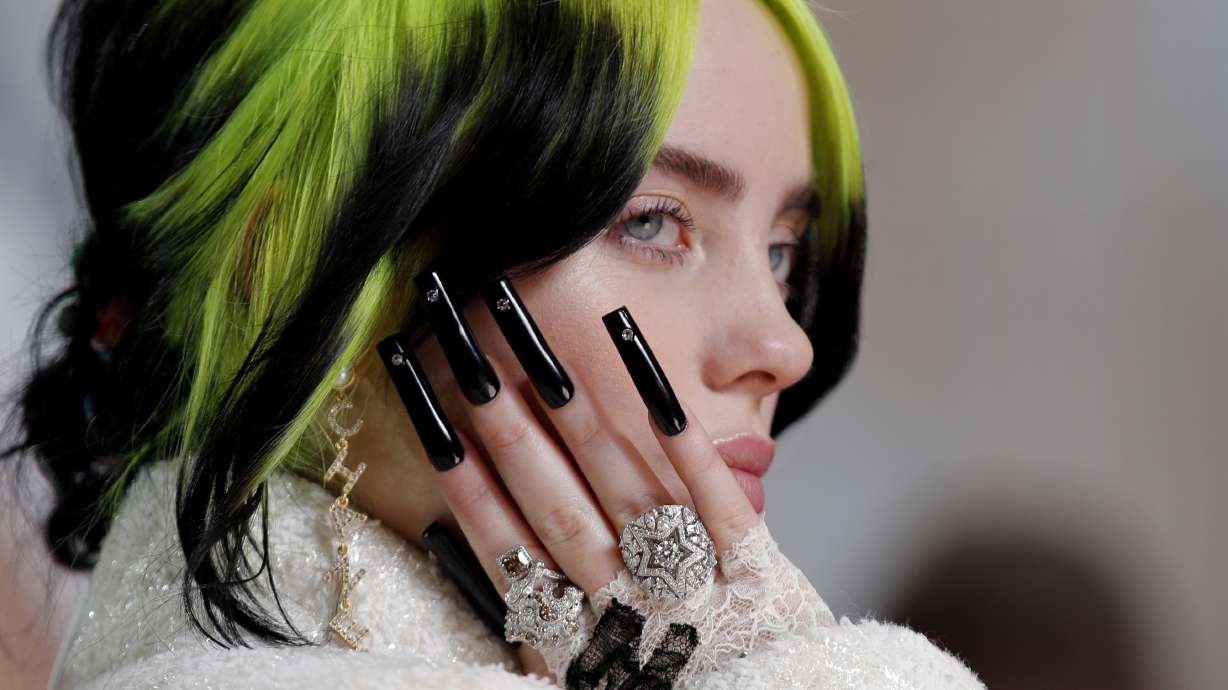 Rapper cites Meghan at UK music awards, wins album of year