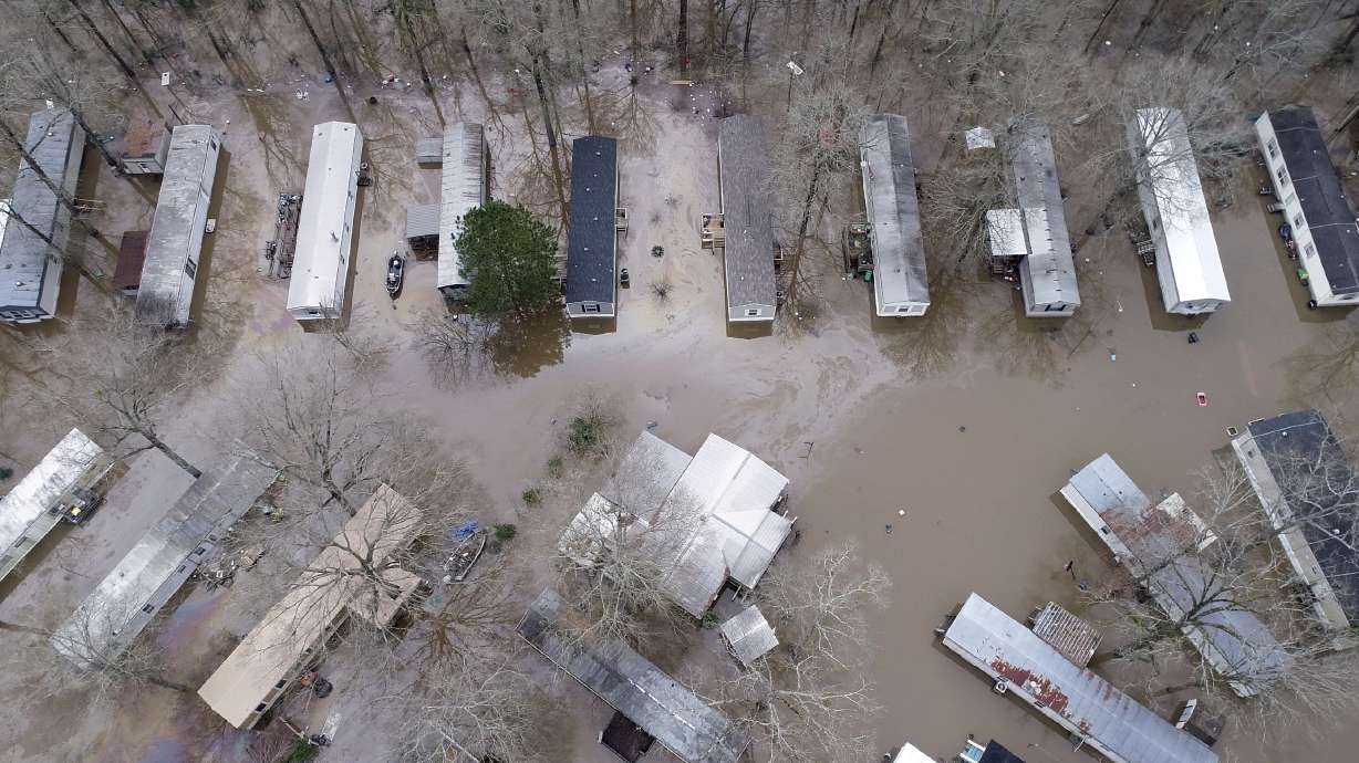 Soggy neighborhoods under flash-flood warning in Mississippi