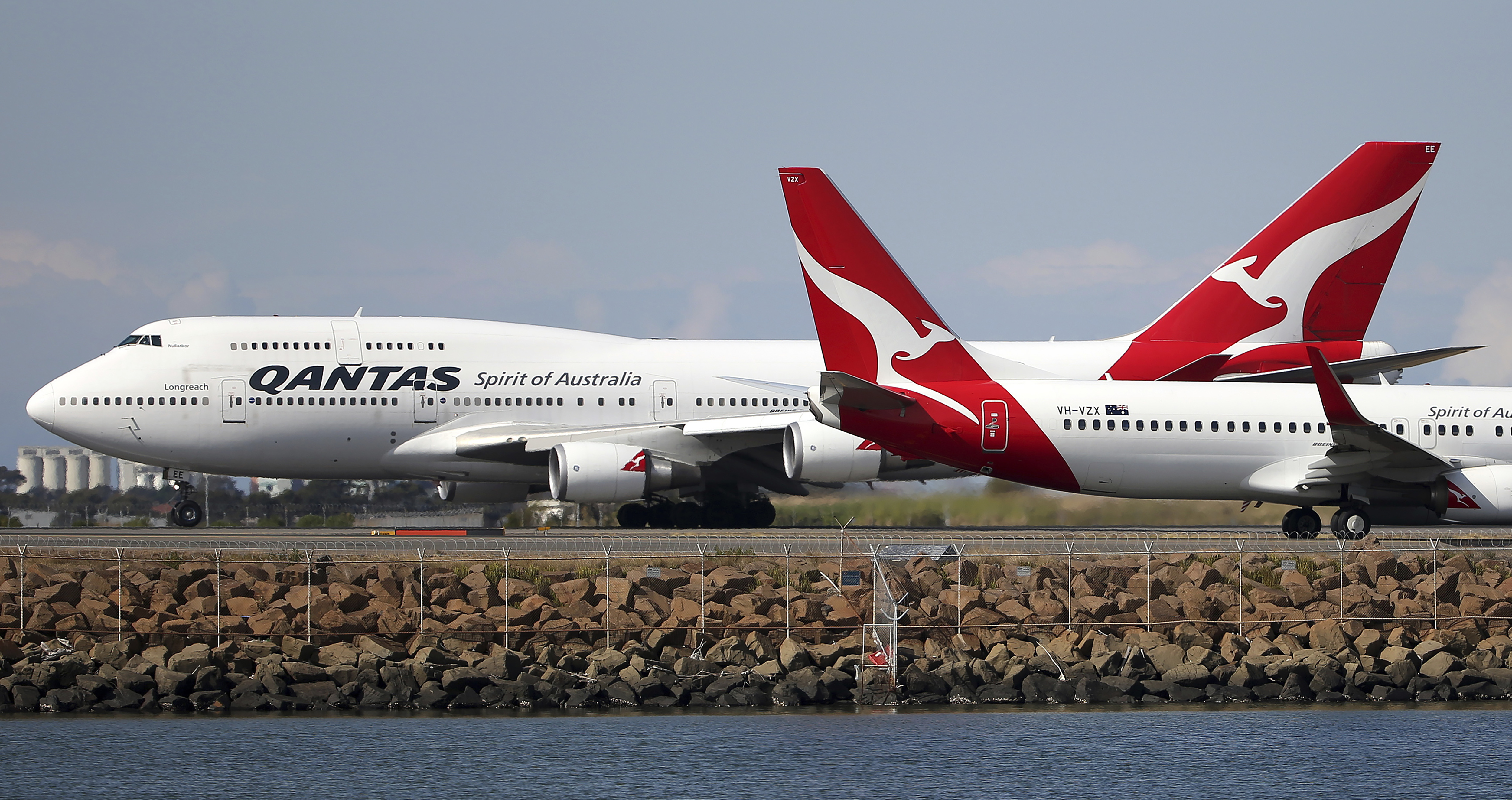 Qantas cuts flights to Asia amid virus outbreak