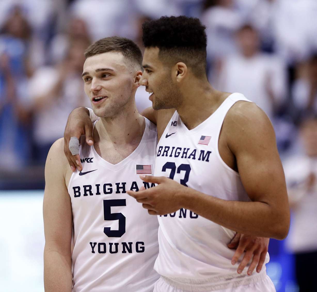 Brigham Young Cougars guard Jake Toolson (5) and forward Yoeli Childs (23) walk off the court after beating Santa Clara at Brigham Young University in Provo on Thursday, Feb. 20, 2020.