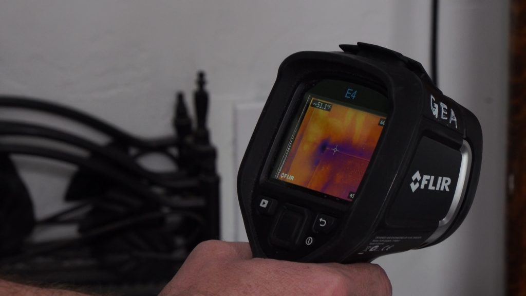 Thomas Camoin of Griffin Energy Audits uses a thermal imaging camera to detect heat loss Thursday, Feb. 20, 2020. Photo: KSL TV