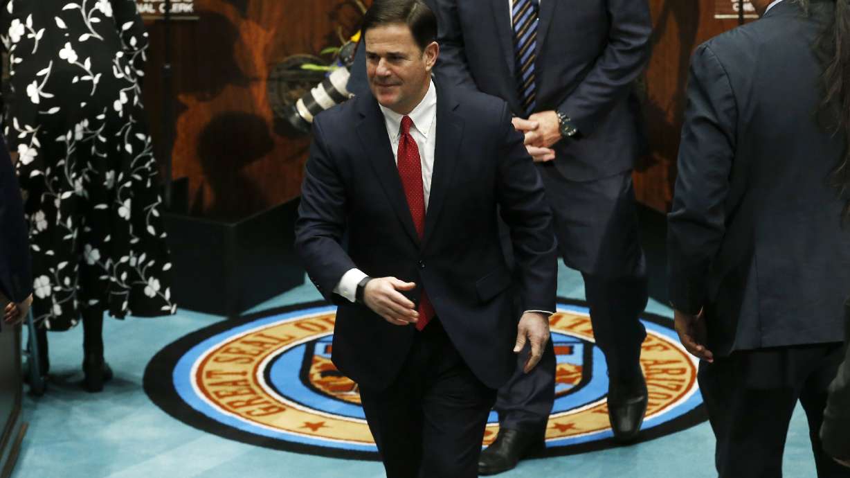 Arizona governor pulls immigration plan amid business revolt